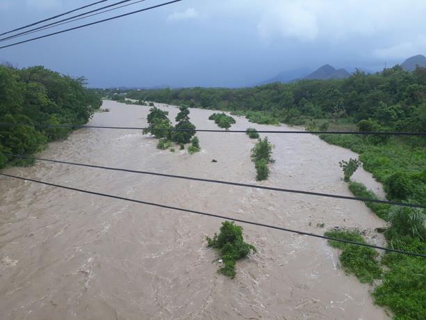 Reportan daños por crecida de ríos y cañadas en el Cibao